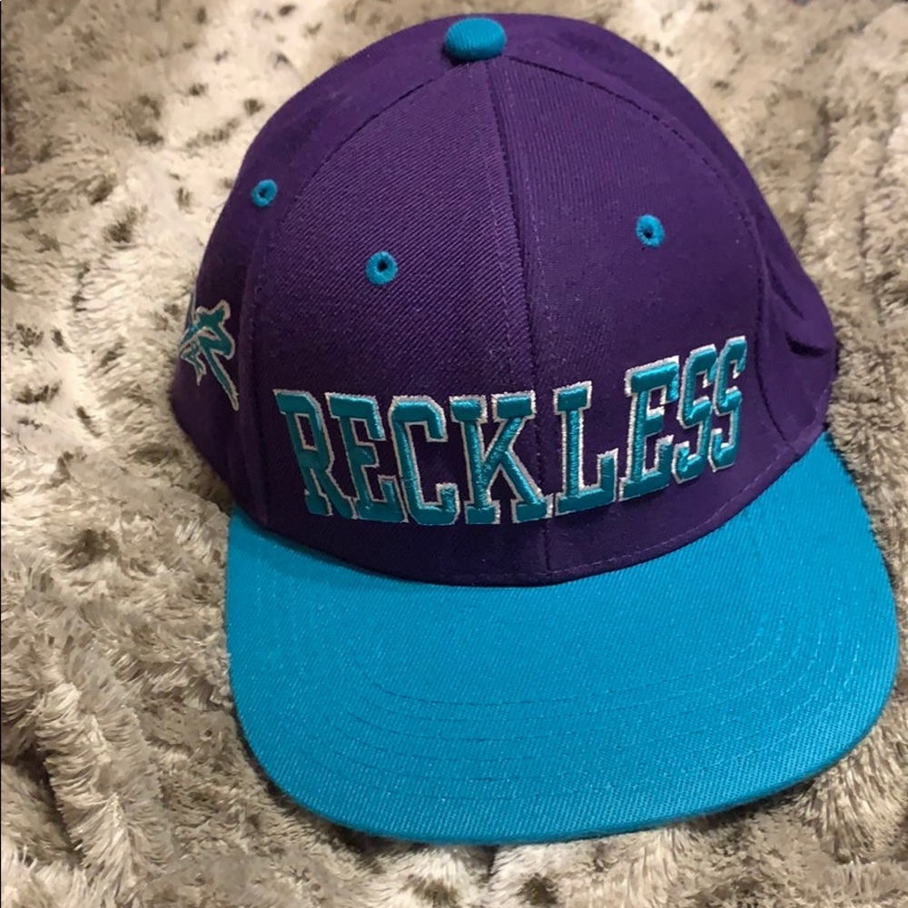 Turquoise and purple hat